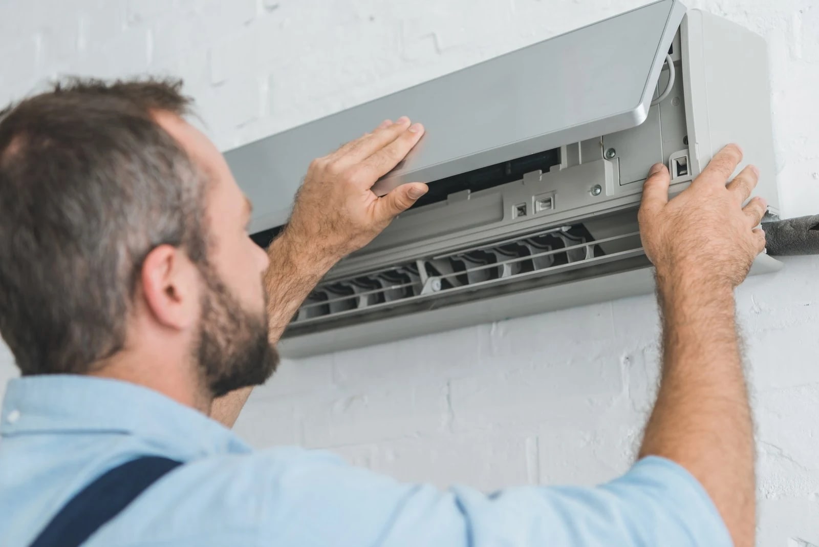 Air conditioning technician at work